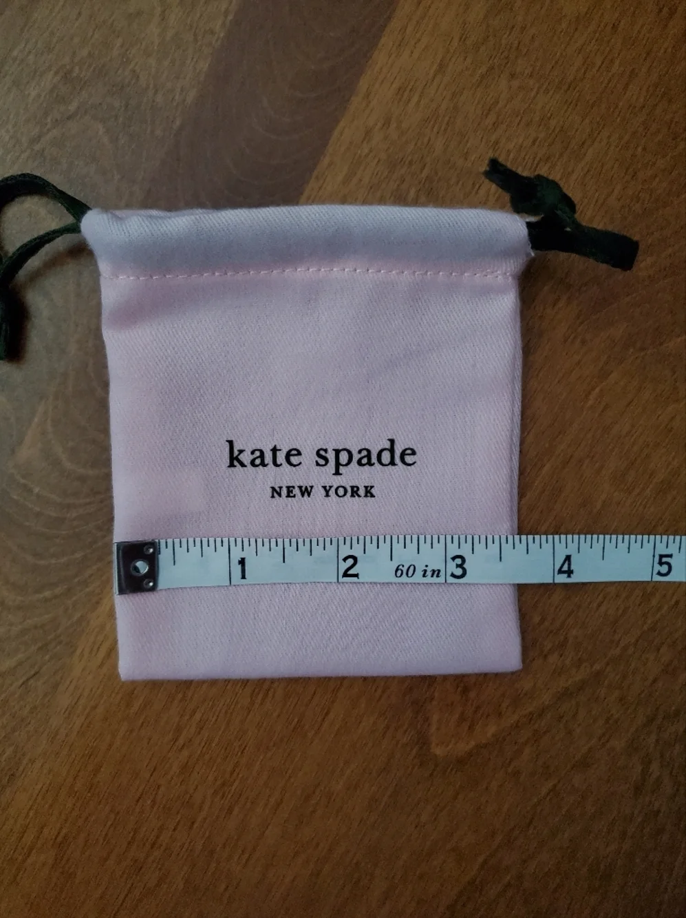 kate spade Pink Drawstring Jewelry Pouch with Green Cords